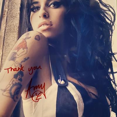 Amy Winehouse signed photo. 8x10 inches