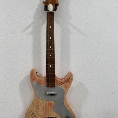 Rare Sex Pistols band signed guitar