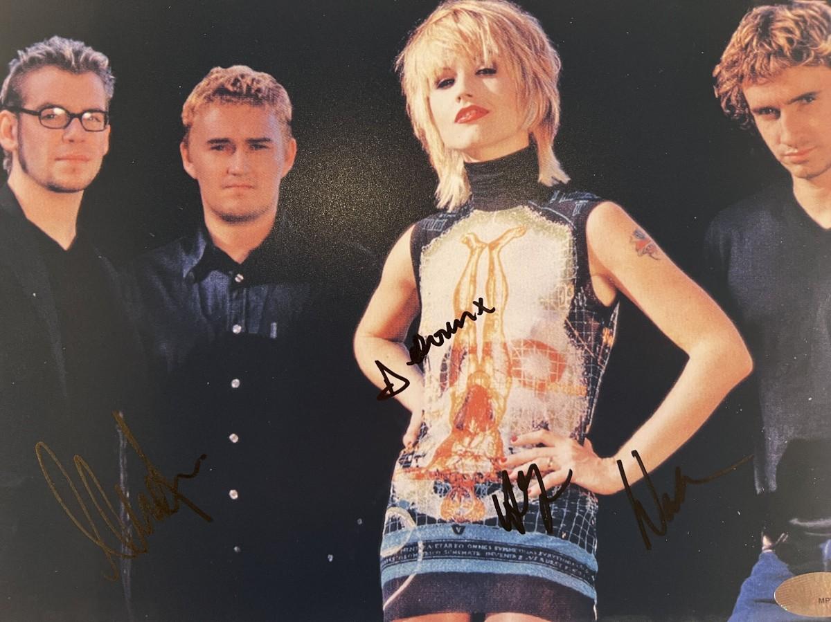 The Cranberries band signed photo | EstateSales.org