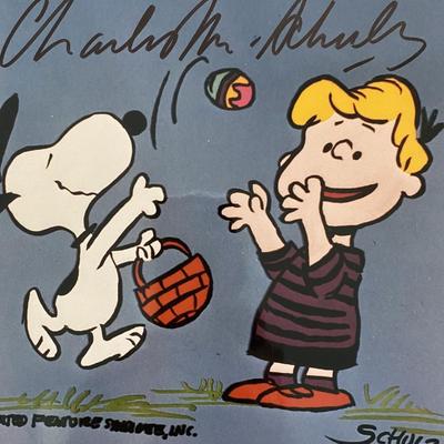 Peanuts Charles Schulz signed photo. GFA Authenticated