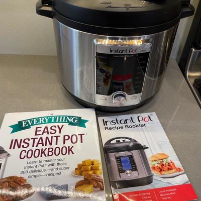 Instapot (New) with inserts & cookbooks
