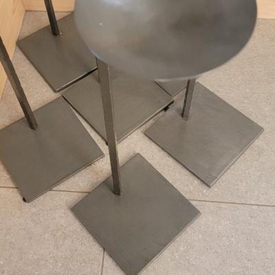 Set of six heavy metal candle stands