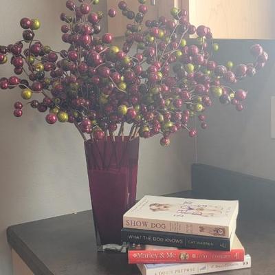 Dog related books, vase with floral