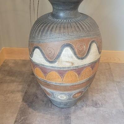 Floor vase with feather like sprigs