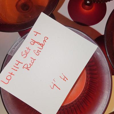 Set of 4 red glass candle holders