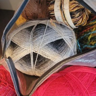 Miscellaneous skeins if yarn, book
