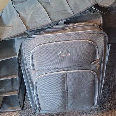 Suitcase and 3 hanging shoe racks