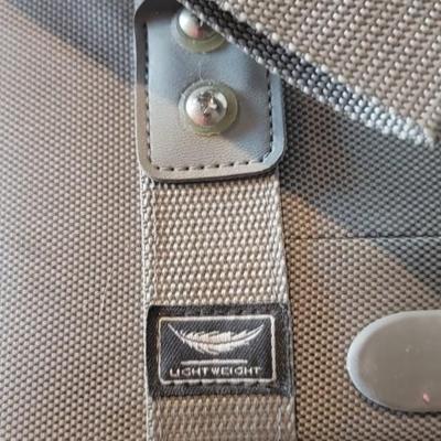 Suitcase and 3 hanging shoe racks