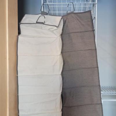 Suitcase and 3 hanging shoe racks