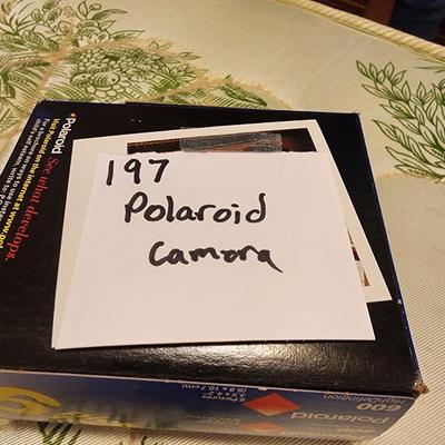 Polaroid camera with film
