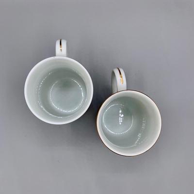 LOT 34 N: Norman Rockwell Mug Collection