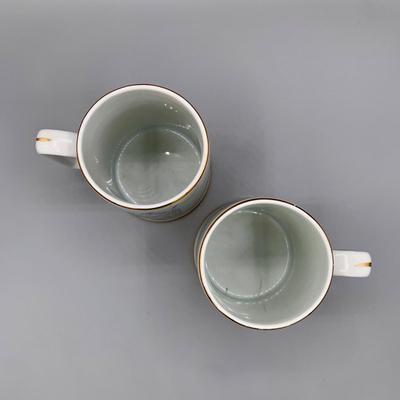 LOT 34 N: Norman Rockwell Mug Collection