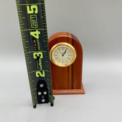 LOT 35 L: Brass Apple Bell, Schlabaugh & Sons Art Deco Miniature Desk Clock, Brass Pineapple Candle Pin, & Metal Star Decor