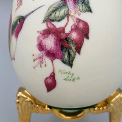 LOT 36 N: Handpainted Hummingbird Glass Vase, Kathy Seek Hummingbird Egg w/ Stand, Lenox Garden Frog, & More