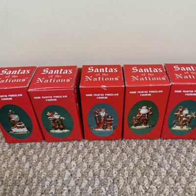 LOT 42B: Santa through the Years & Santa’s of the Nations Porcelain Figurines w/ Boxes
