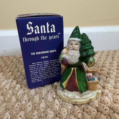 LOT 42B: Santa through the Years & Santa’s of the Nations Porcelain Figurines w/ Boxes