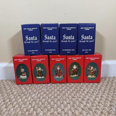 LOT 42B: Santa through the Years & Santa’s of the Nations Porcelain Figurines w/ Boxes