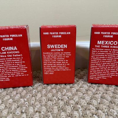 LOT 42B: Santa through the Years & Santa’s of the Nations Porcelain Figurines w/ Boxes