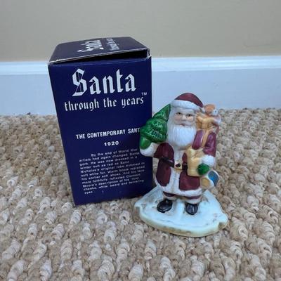 LOT 42B: Santa through the Years & Santa’s of the Nations Porcelain Figurines w/ Boxes