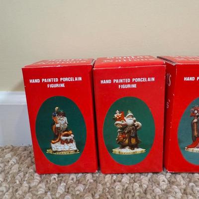 LOT 42B: Santa through the Years & Santa’s of the Nations Porcelain Figurines w/ Boxes