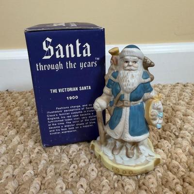 LOT 42B: Santa through the Years & Santa’s of the Nations Porcelain Figurines w/ Boxes