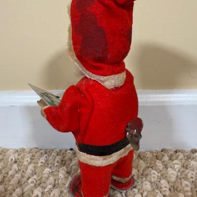 LOT 54B: Vintage 1960s Japan Tin Litho Wind Up Santa w/ Book