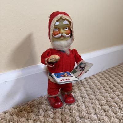 LOT 54B: Vintage 1960s Japan Tin Litho Wind Up Santa w/ Book