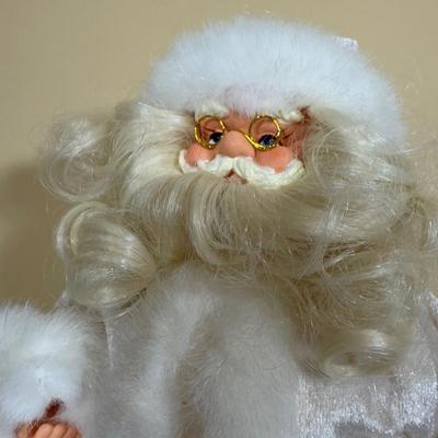 LOT 64B: Mrs Claus in Rocking Chair, White Santa, Woodland Santa & Chimney Sculpture