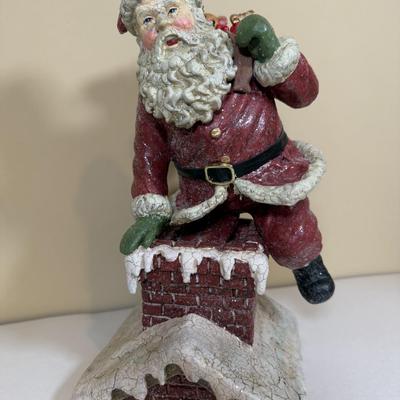LOT 64B: Mrs Claus in Rocking Chair, White Santa, Woodland Santa & Chimney Sculpture