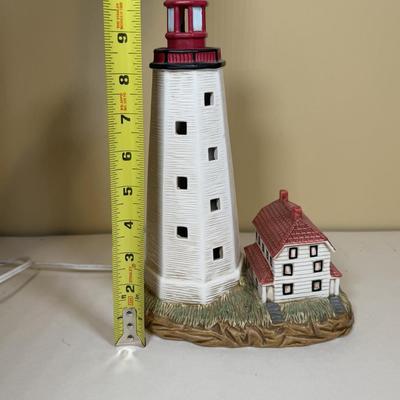 LOT 165B: Lefton Sandy Hook Lighthouse, Shaped Driftwood, Swirl Glitter Bird Sculpture, Carruth Frog Baby Sculpture & More