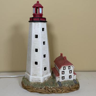 LOT 165B: Lefton Sandy Hook Lighthouse, Shaped Driftwood, Swirl Glitter Bird Sculpture, Carruth Frog Baby Sculpture & More