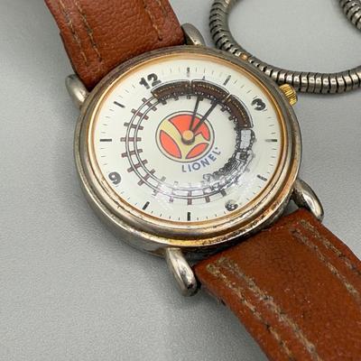 LOT 198J: Train Collection - Lionel Wristwatch, Pocket Watch, Avon Mug & More