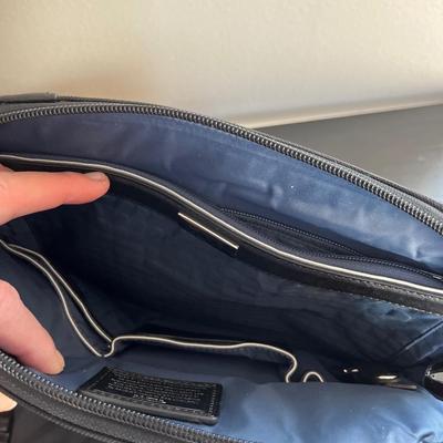 Tumi purse and AquaTech rain cover