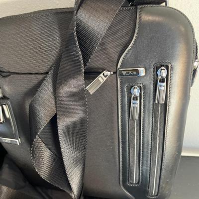 Tumi purse and AquaTech rain cover