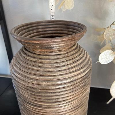 Two vases and a broom