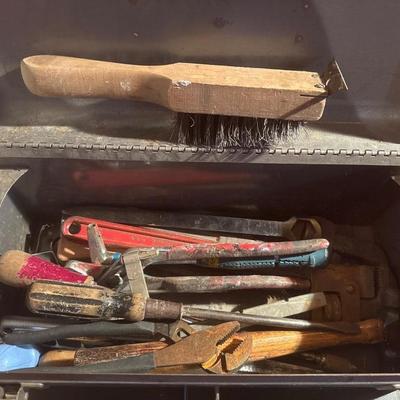 Metal Craftsman toolbox with assortment of tools