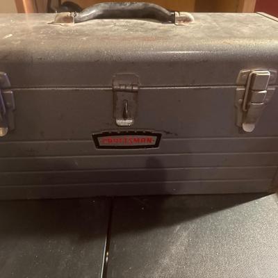 Metal Craftsman toolbox with assortment of tools