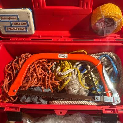 Red toolbox with random Hardware and socket set that is missing a 6 inch extension bar