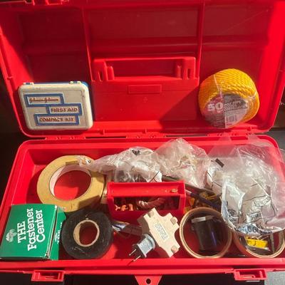 Red toolbox with random Hardware and socket set that is missing a 6 inch extension bar