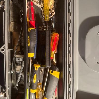 Plastic Craftsman toolbox with assortment of tools