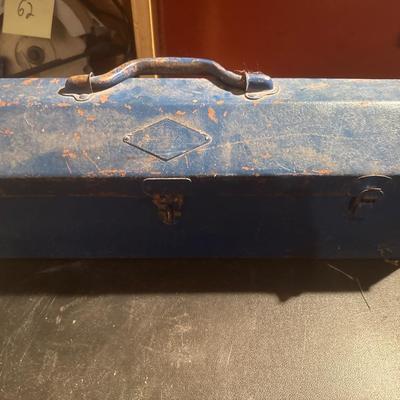 Vintage blue metal toolbox with tools