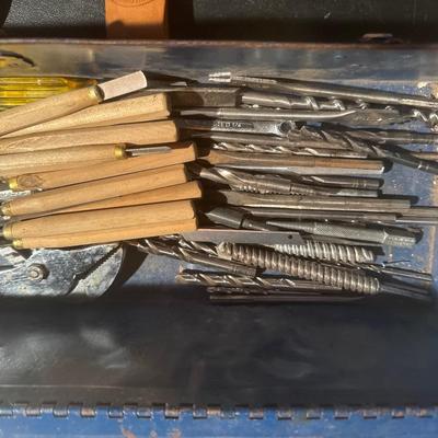 Vintage blue metal toolbox with tools