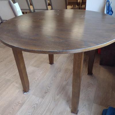 Wood Finish Four Leg Round Display Table