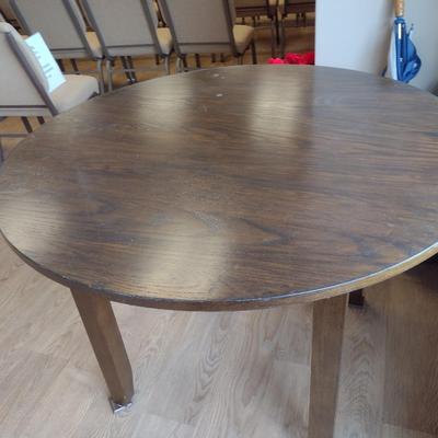 Wood Finish Four Leg Round Display Table