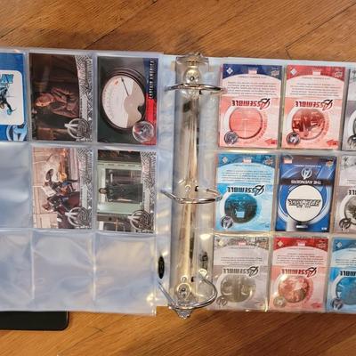 1 full and 1 partial albums of trading cards