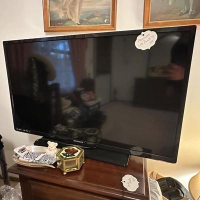 Lot 4: Magnavox TV, Clothing and more