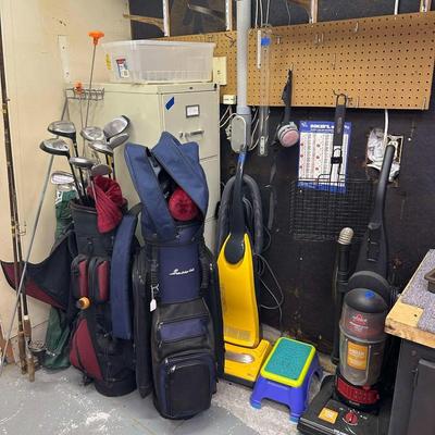 Lot 20: Golf equipment, cabinets,, tools, and more