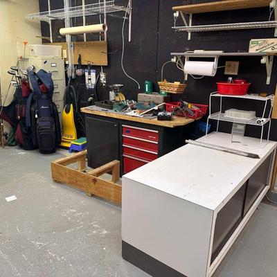 Lot 20: Golf equipment, cabinets,, tools, and more
