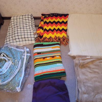 Lot of blankets and handmade afghans