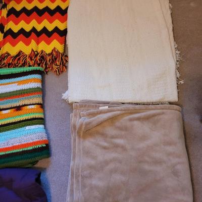 Lot of blankets and handmade afghans